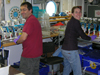 Tim Shanahan and Kim Popendorf working in the main lab of Oceanus.