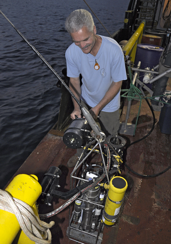 Cabell Davis prepares holocam for deployment in Gulf