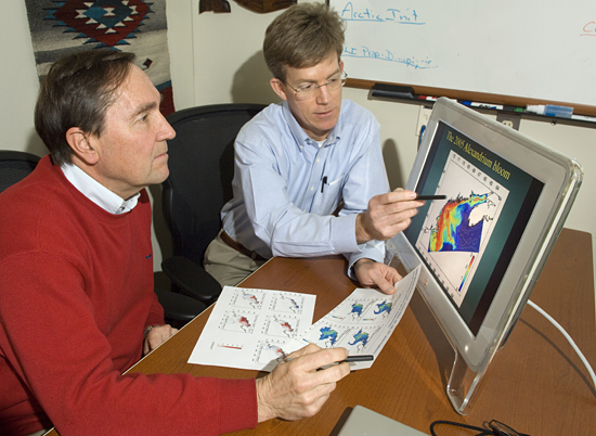 Don Anderson and Dennis McGillicuddy reviewing HAB model data.
