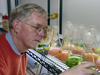 Dr. John Waterbury looking at phytoplankton samples in his lab.