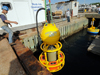 Putting Environmental Sample Processor into test well