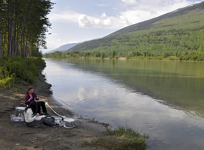 MIT/WHOI Joint Program graduate students Britta Voss (back) and Sarah Rosengard (front) sample the Fraser River at McBridge in the upper reaches of the Rocky Mountain Trench in June 2011. 