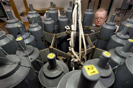 George Tupper working on water sampler in Clark south highbay.