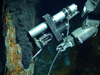 Isobaric gas-tight sampler taking sample from vent at Mid-Cayman Rise