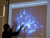 Tracy Mincer and image of DAPI-labeled particle