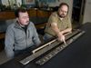Camilo Ponton and Liviu Giosan examine a sediment core from India