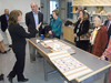 Darlene Ketten (at left) showing trustee tour group the WHOI CSI.