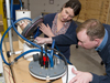 Kate McMonagle and John Lund work on a carbon dioxide sensor