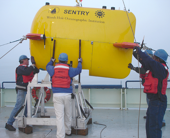 Al Duester, center, coordinating the recovery operations of AUV Sentry.