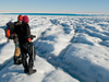 Sarah Das and Ian Joughin view supraglacial lake on Greenland ice sheet
