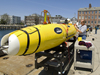 Bob Elder working on REMUS 3000 at WHOI dock.