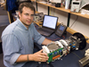 Rich Camilli in the lab with Gemini, his miniature mass spectrometer. 