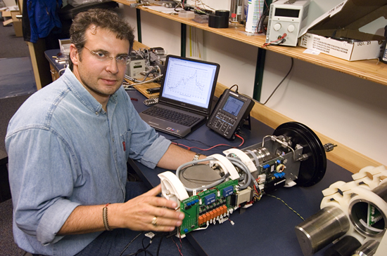 Rich Camilli in the lab with Gemini, his miniature mass spectrometer. 