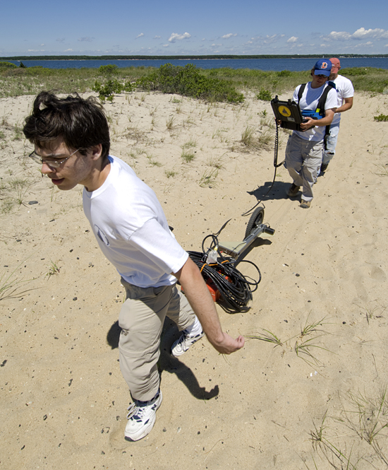 Summer Student Fellow Andrew Delman and colleagues.