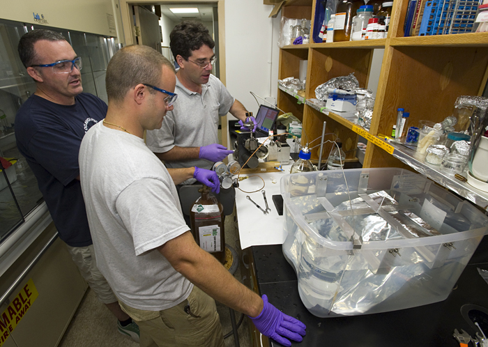 Reddy, Sylva, and Seewald retrieving sample of Deepwater Horizon oil from Seewald sampler