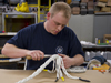 Christopher Ross splices a mooring line