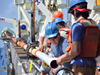 a liner of PVC pipe being inserted into WHOI's long corer