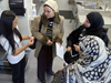Maya Yamato with Middle Eastern visitors