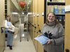 Ann Devenish and Ellen Levy working in the WHOI Data Library/Archives.