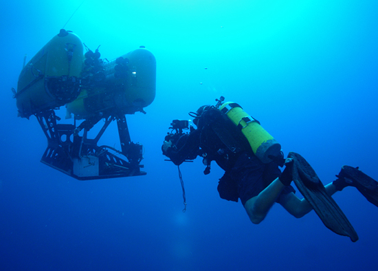 diver and nereus under water