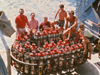 group of engineers pose with NOBEL system of seafloor explosive charges
