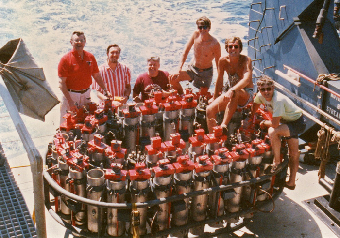 group of engineers pose with NOBEL system of seafloor explosive charges