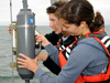 Summer Student Fellows on Tioga with water sampler