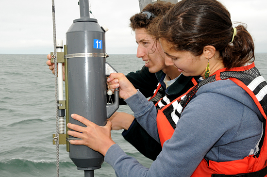 Summer Student Fellows on Tioga with water sampler
