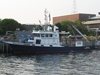 The sister vessels R/V Tioga and R/V Gulf Challenger (UNH) at the WHOI pier.