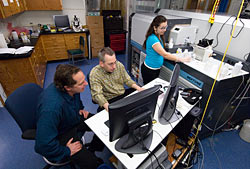 Ken Sims, Bernhard Peucker-Ehrenbrink, and Tracy Atwood working in the ICP facility