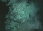 White Billowing Plume Full of Sulfur and Ash