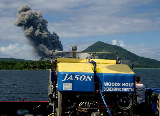 The ROV Jason II and Robert Fuhrmann look on as Mount Tavurvur belches ash.