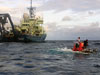 The research vessel Atlantis serves as the support vessel for Alvin operations.