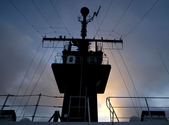 The conning station of the USCGC Healy in the sunrise.