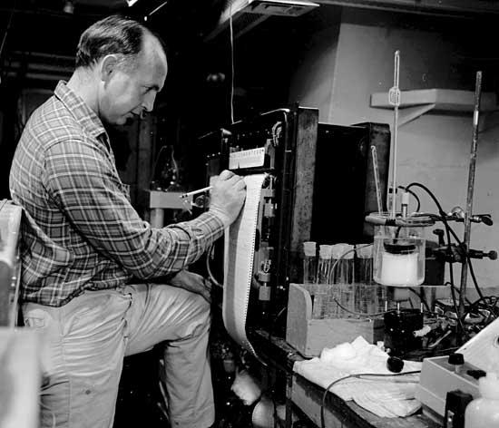 Stanley W. Watson monitors the oxygen uptake of microbes in a seawater  sample during R/V Chain cruise.