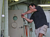 DSV Alvin pilot Anthony Tarantino practices for the summer baseball season aboard the R/V Atlantis.