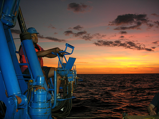 Thomas Anthony operating the crane aboard R/V Melville 