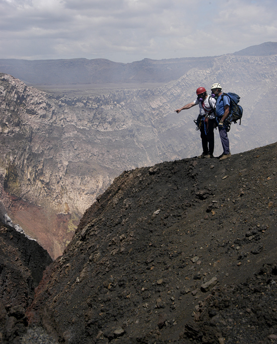 WHOI geochemist Ken Sims and climber Dennis Jackson overlooking Masaya volcano in Nicaragua.