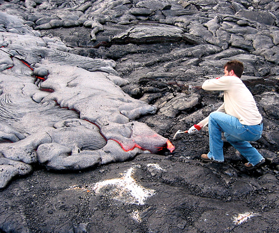 MIT/WHOI Joint Program student Matt Jackson working with lava.