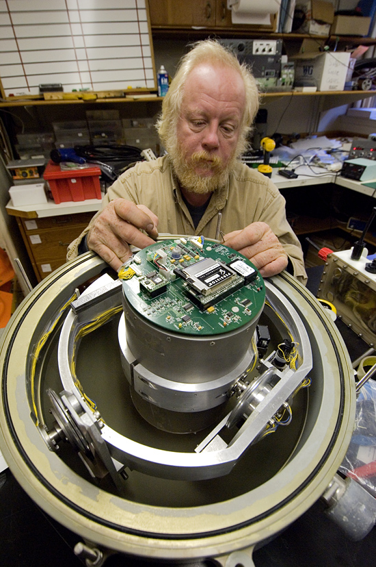 Victor Bender working on an ocean bottom seismometer (OBS).