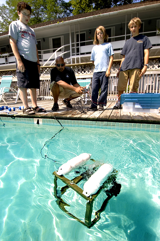 Rick Rupan instructing students in ROV piloting.