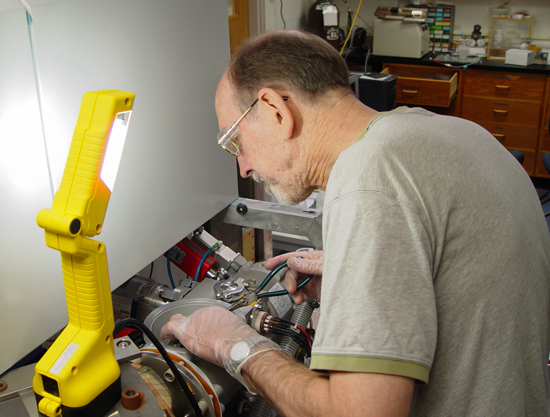 Dave Schneider working in lab.