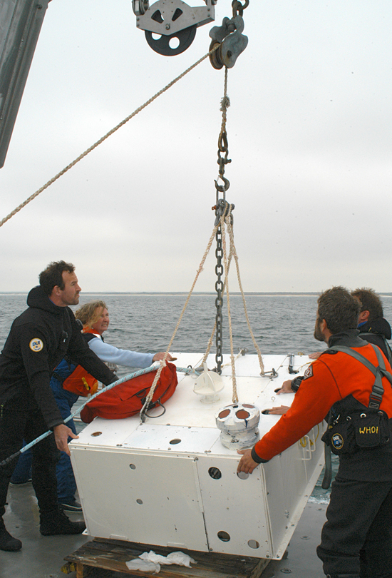 Scientists deploy an undersea node off the R/V Tioga near the ASIT tower of the MVCO.