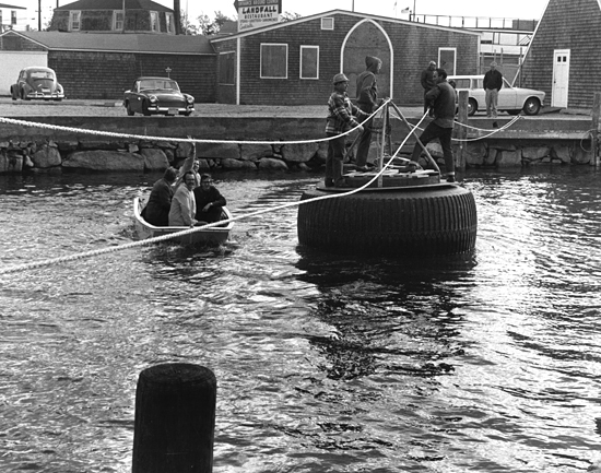 Al Vine and colleagues rigged this tire ferry to keep foot traffic moving on Water Street in Woods Hole.