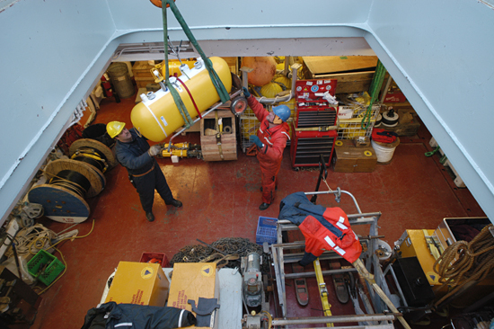 Equipment and data are delivered into the Canadian icebreaker  Louis S. St-Laurent's hold.