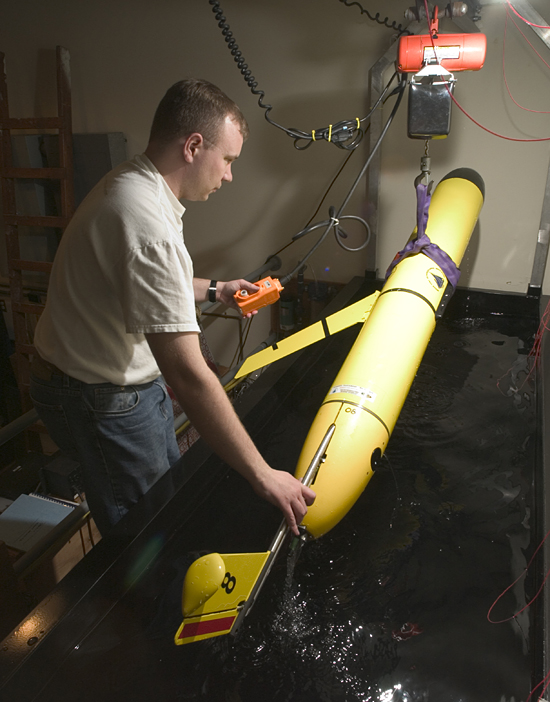 John Lund in lab with Glider.