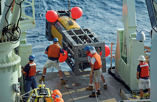 The WHOI mooring group deploys a University of Miami mooring from R/V Knorr.