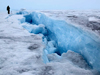 Massive bottomless crack in ice sheet.
