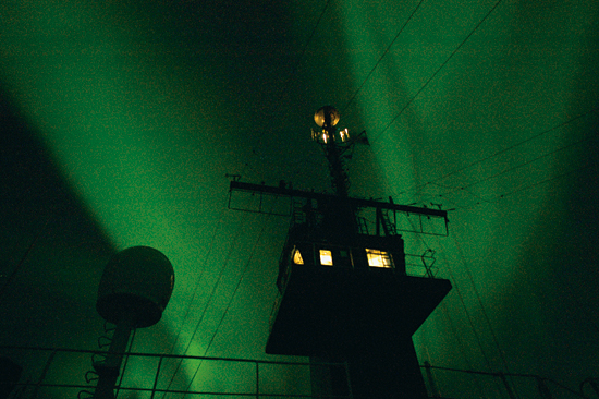 Aurora behind ship mast