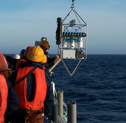 the Submersible Incubation Device (SID) hangs from a cable